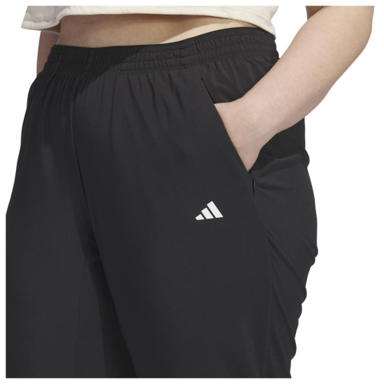 Adidas Γυναικείο παντελόνι φόρμας Training Pants (Plus Size) Adidas Γυναικείο παντελόνι φόρμας Training Pants (Plus Size)